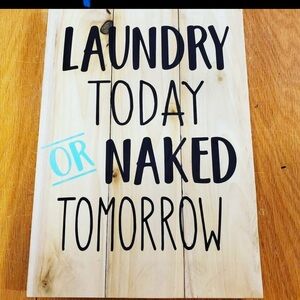 Wooden Laundry Sign with Black and Blue Text